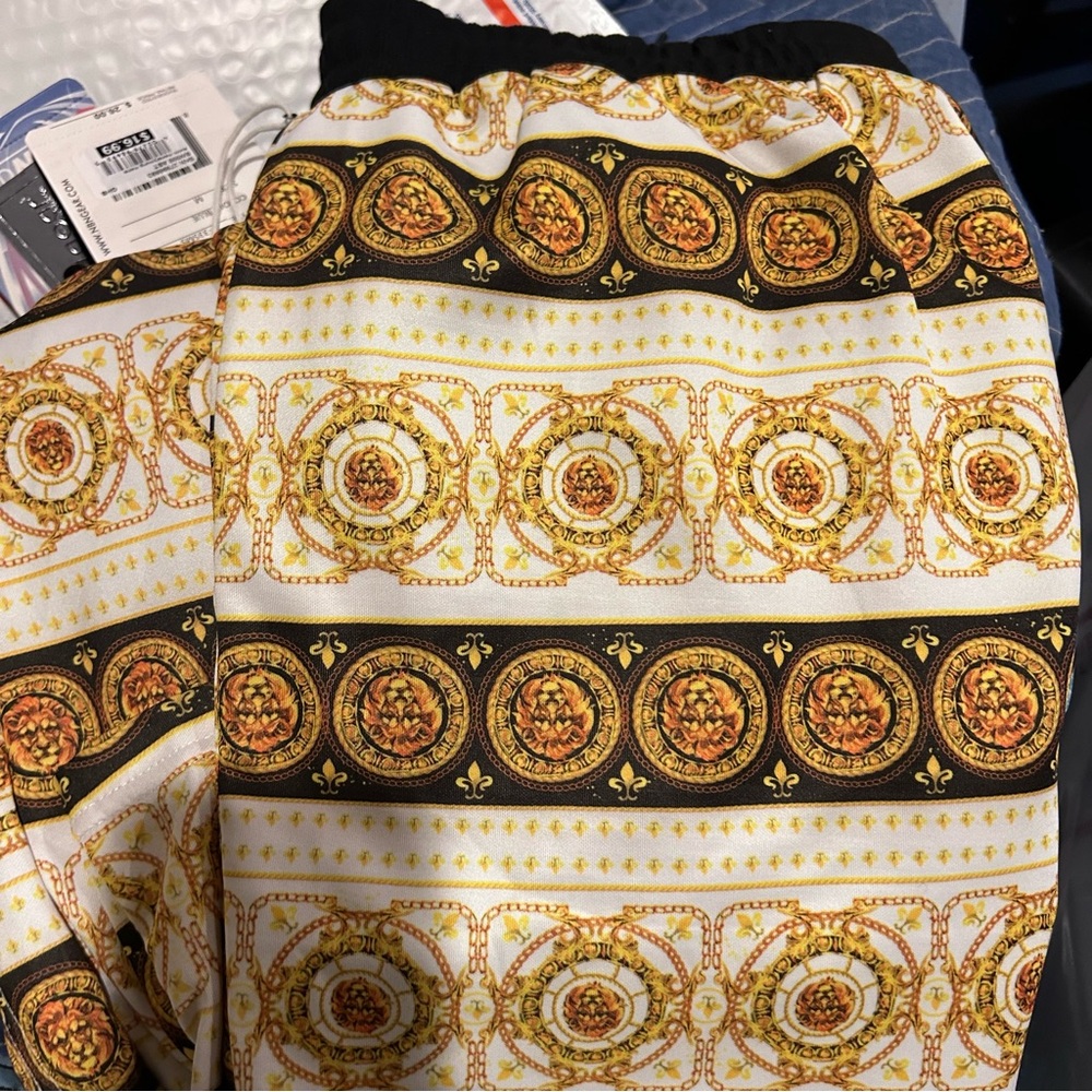 g-net gold chain swim trunks